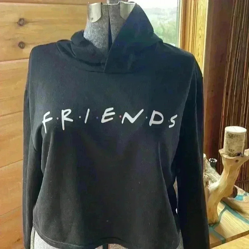 Friends women’s short hooded lightweight sweatshirt. Missing front hood string.